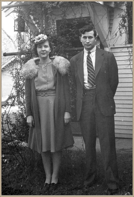 Mom & Dad in front of 3 Sunnyside