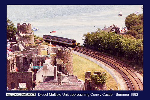 BR DMU approaching Conwy Castle 1992