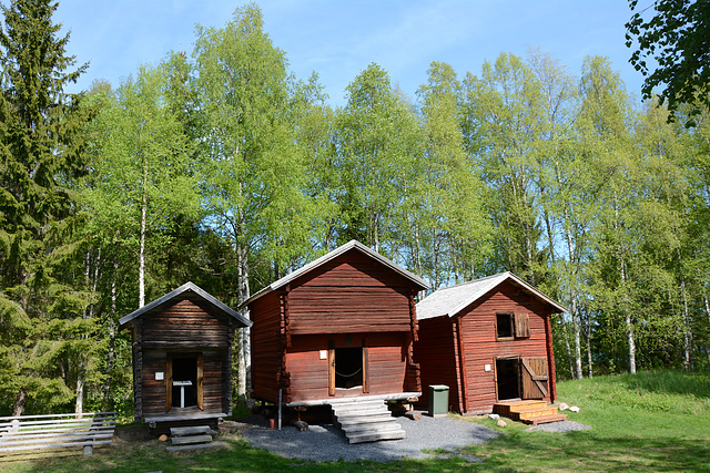 Finland, Three Wooden two-story Buildings at Turkansaari Open Air Museum