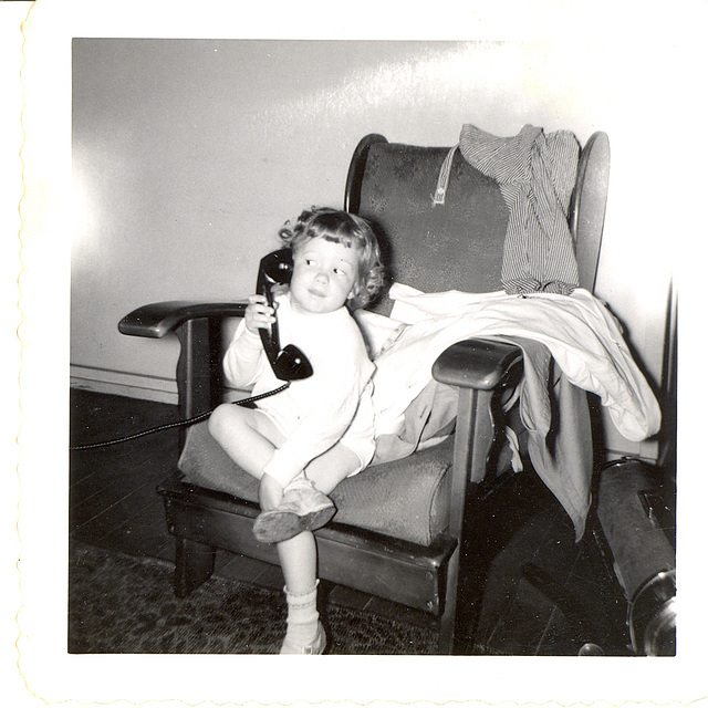 My wife, age 3, on the Telephone in the Vintage Photos Theme Park
