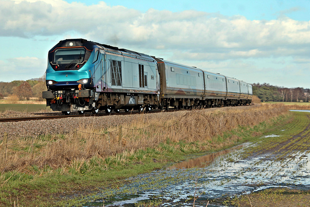 TPE class 68 68019 BRUTUS with 1F68 13:34 Scarborough - Liverpool at Willerby Carr Crossing 2nd March 2020.