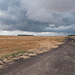 a trail to a distant storm