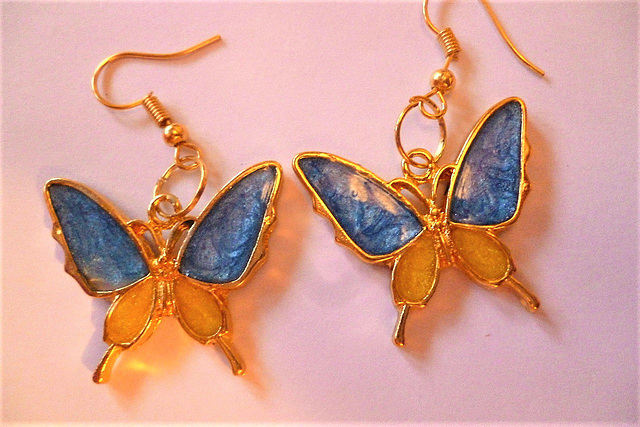 Different coloured butterfly earrings