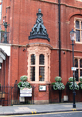 Detail of former house on the corner of Kensington Court, Kensington, London