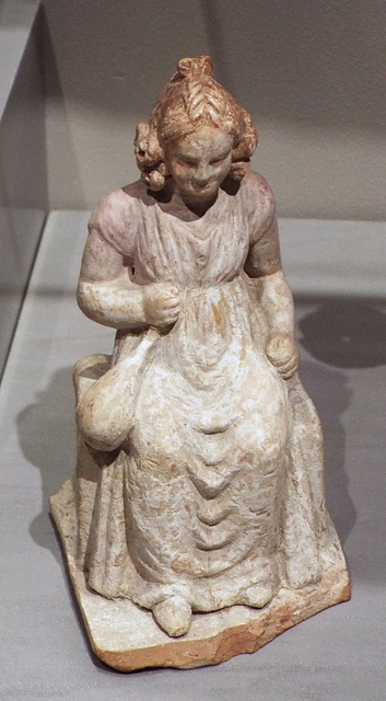 Girl Clutching a Bag of Knucklebones Terracotta Figurine in the Boston Museum of Fine Arts, January 2018