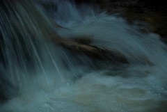 Stock in brodelnden Wassern