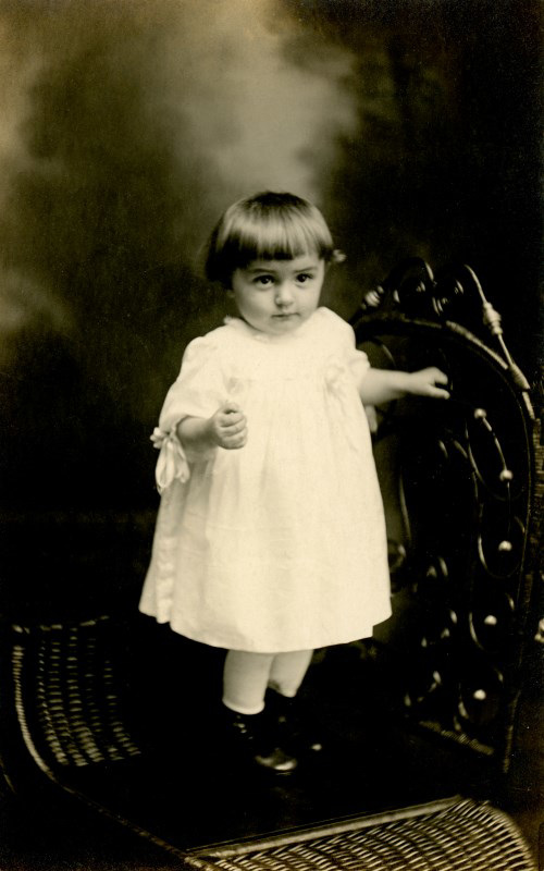 Grace Reber Standing on a Chair