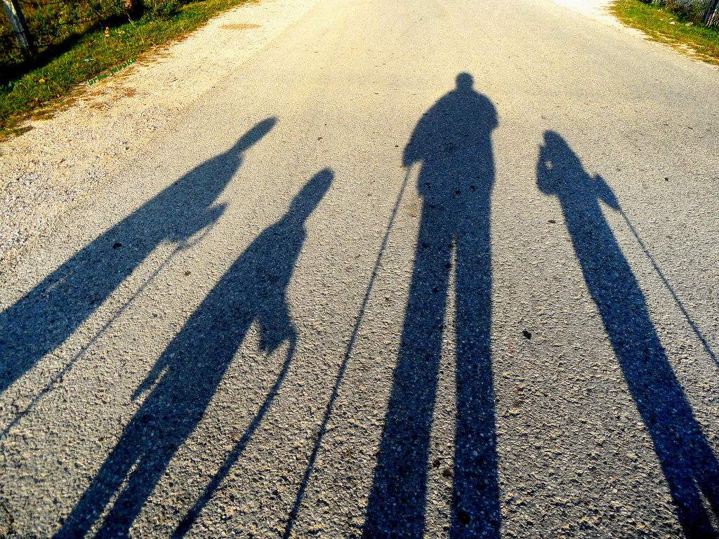 One grandfather and three granddaughters in the walk