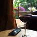 still life with wine glass and cell phone