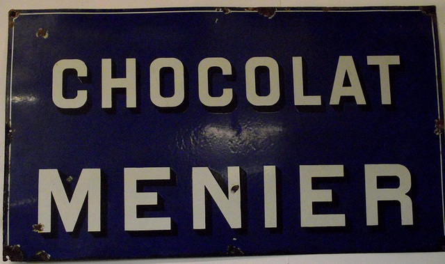 Vieille plaque publicitaire pour le chocolat Menier
