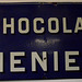Vieille plaque publicitaire pour le chocolat Menier