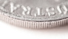 Fluted coin edge