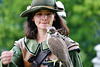 Falconer and hooded bird