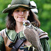 Falconer and hooded bird