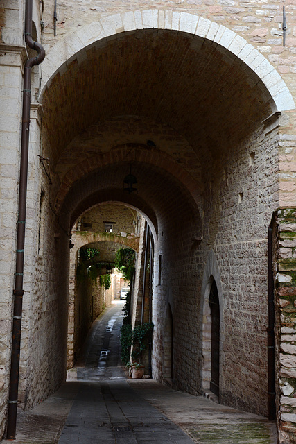Italy, Arches and Tunnels of Narrow Streets in Assisi Italy, Arches and Tunnels of Narrow Streets in Assisi