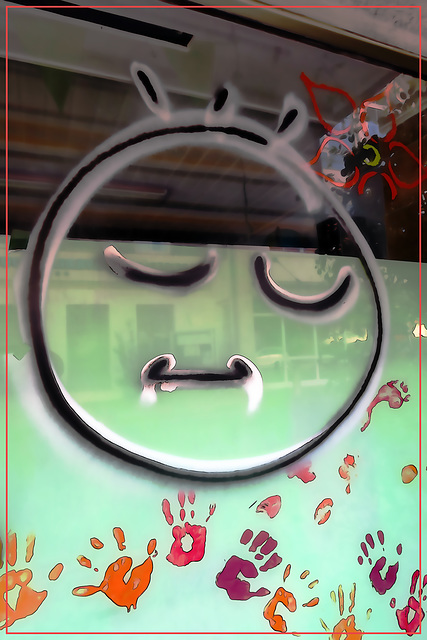 sad smiley on windowpane