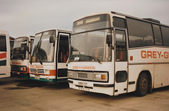 Grey Green vehicles parked near Cambridge Coach Services yard in Waterbeach – 6 Jan 1991 (135-25)