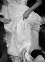 Admiring the Bride's gown during a wedding reception at The Bridges, San Ramon, CA