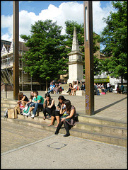 sitting on Bonn Square steps