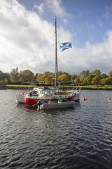 Three Boats and a Flag