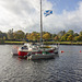 Three Boats and a Flag