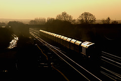 EWS Class 66 No.66183 on empty Coal Hoppers at Colton Jnc 25th November 2006