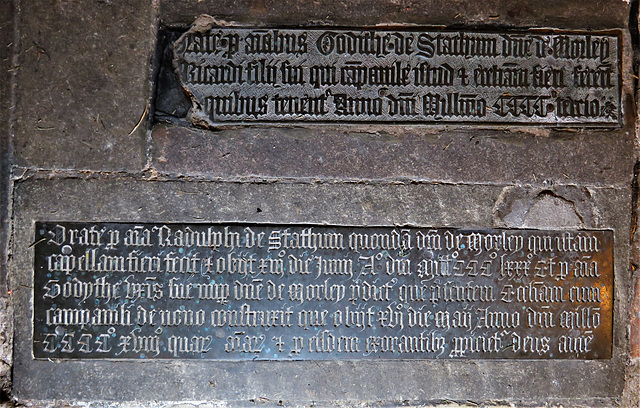 morley church, derbs; c14 and c15 tomb brass with orate inscriptions of 1403 to goditha stathum and son richard, and to ralph stathum +1380 and goditha +1418, named as builders of tower and north chap