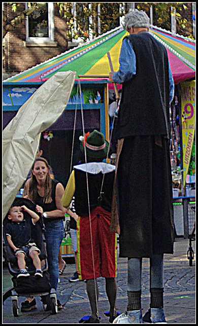 Strange Walkers on the Fair