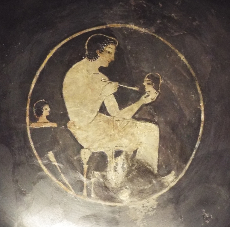 Detail of a Kylix with a Man Painting a Head by the Ambrosios Painter in the Boston Museum of Fine Arts, January 2018