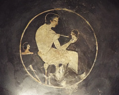 Detail of a Kylix with a Man Painting a Head by the Ambrosios Painter in the Boston Museum of Fine Arts, January 2018