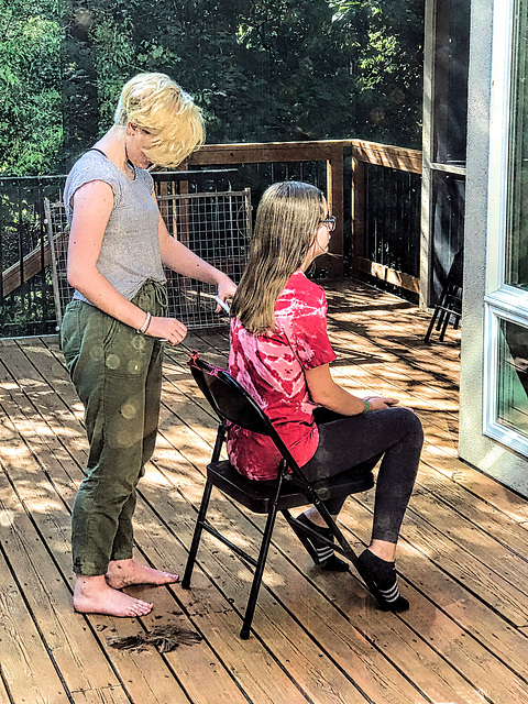 Outdoor haircut Two granddaughters.