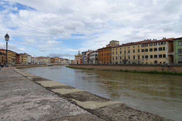 Looking Along The Arno In Pisa