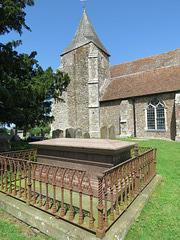 old romney church, kent (3)late c19 tomb of thomas tuearsely tunbridge, c13 tower and aisle with c14 window and buttresses