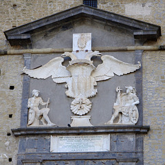 Entry gate with the imperial eagle of Charles V