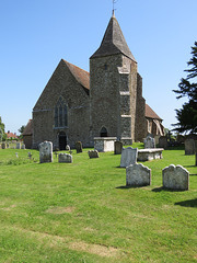 old romney church, kent (2)early c12 nave with early c13 tower, buttresses and west window early c14