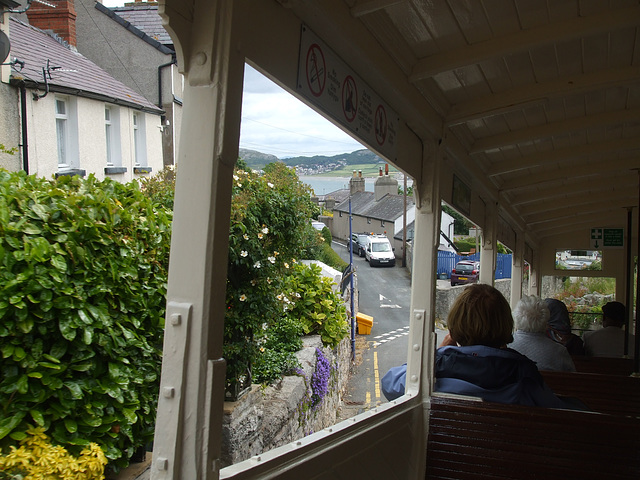 DSCF9883 The bay and rooftops of Llandudno seen from Great Orme Tramway car 4