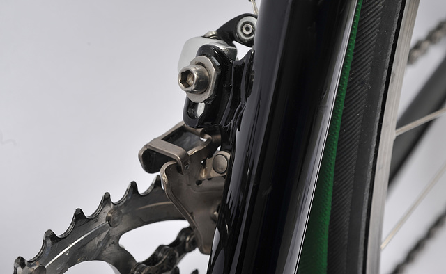 Braze on front derailleur allows rear wheel insertion/removal with a fully aired tires despite the short chain stays.