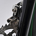 Braze on front derailleur allows rear wheel insertion/removal with a fully aired tires despite the short chain stays.