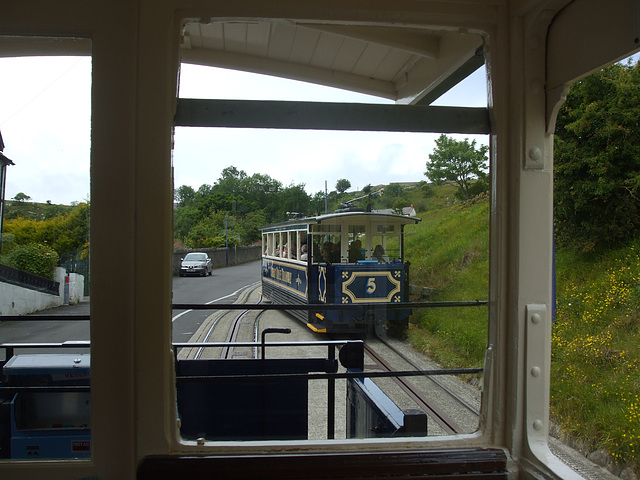 DSCF9878 Cars 5 and 4 pass on the lower section of the Great Orme Tramway
