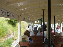 DSCF9877 Cars 5 and 4 pass on the lower section of the Great Orme Tramway
