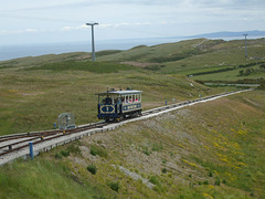DSCF9869 Car 7 approaching the midway point on the upper section of the Great Orme Tramway. Seen from descending car 6.