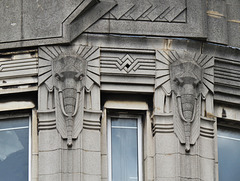 13-14 nelson rd., greenwich, london, 1932 deco building with elephants in middle of greenwich, seemingly built for burtons. pevsner is particularly poor on south london, and doesn't cover such buildings at all. it's not protected, being only loc