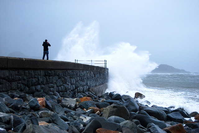 Fence at the end of the pier on a stormy day!