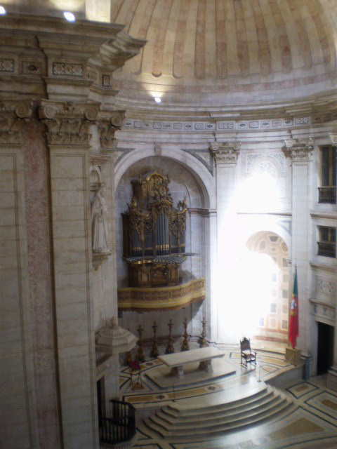 Tubular organ viewed from inside balcony.