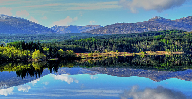 Morning reflections on Loch Garry, Lochaber, Scotland