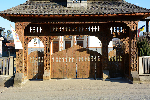 Romania, Maramureș, Wooden Carved Gates to the Biserica Noua in Ieud