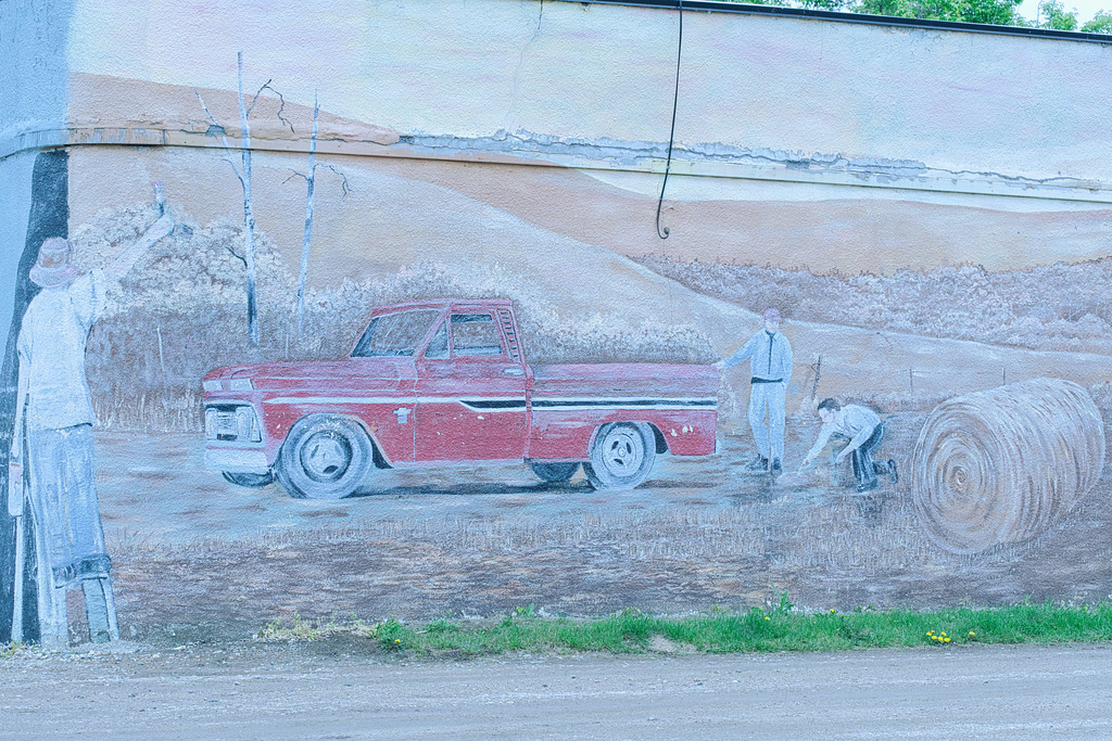 painter with mural