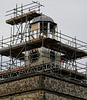 Mending the clock tower