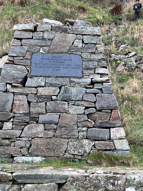 Erected by the people of Cullen to remember Tony Hetherington (1940-1993) who built these steps single handed in 1987