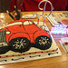 photo # 3)   The Car Cake now set up at the Restaurant....